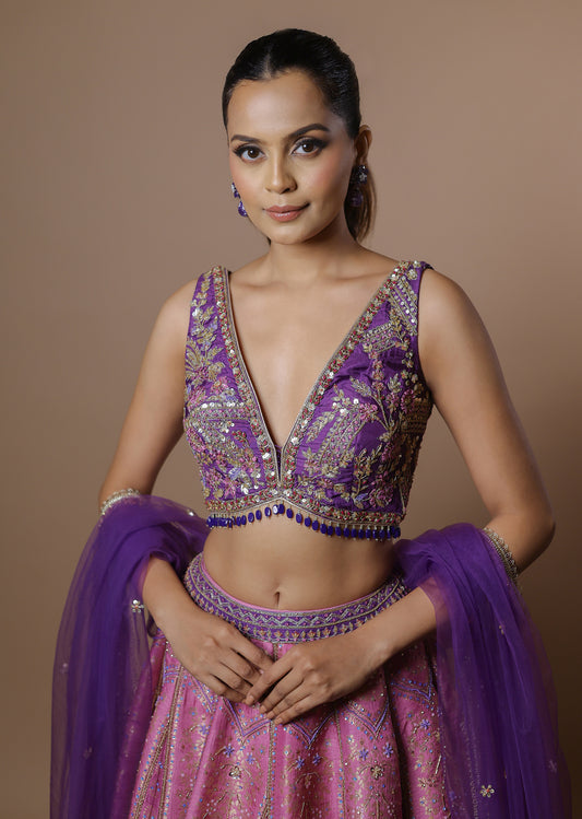 Lavender-pink embellished lehenga set with crystal blouse and net dupatta