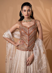 Beige and Rust Embroidered Lehenga Set