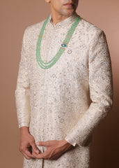 Ivory raw silk embroidered half-work sherwani with trousers