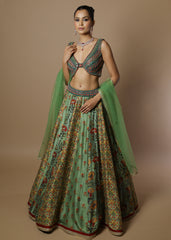 Sage green floral printed lehenga with mirror work blouse