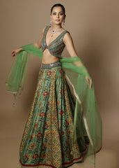 Sage green floral printed lehenga with mirror work blouse