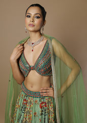 Sage green floral printed lehenga with mirror work blouse